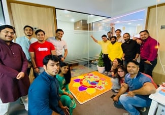 A group of people posing for the camera

Description automatically generated